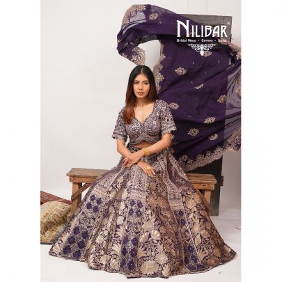 Purple Silk Lehenga Paired With Organza Dupatta
