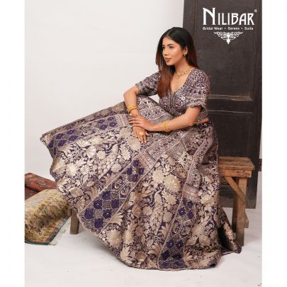 Purple Silk Lehenga Paired With Organza Dupatta