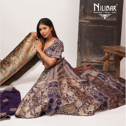 Purple Silk Lehenga Paired With Organza Dupatta