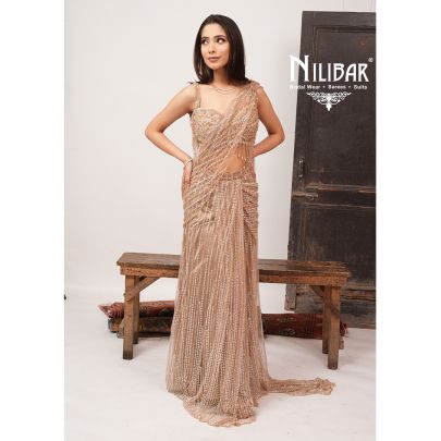 Beige Gold Heavy Embroidered Net Blouse Paired With Pleated Drape Saree
