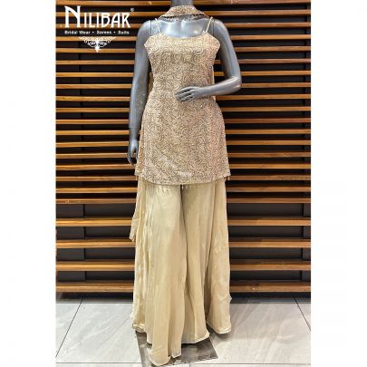 Light Ivory Net Top Paired With Crepe Palazzo Suit