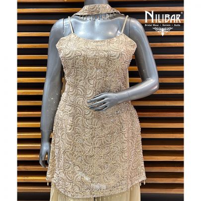 Light Ivory Net Top Paired With Crepe Palazzo Suit