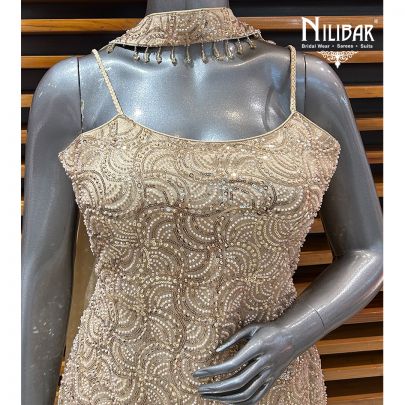 Light Ivory Net Top Paired With Crepe Palazzo Suit