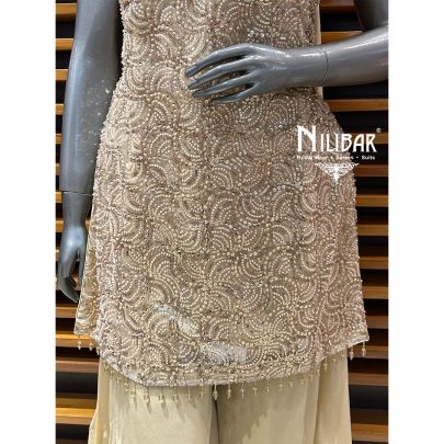Light Ivory Net Top Paired With Crepe Palazzo Suit