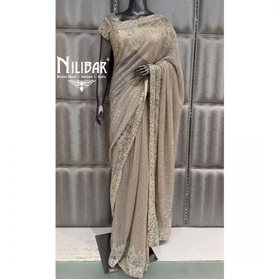 Champagne Gold Net Stitched Blouse Paired With Unstitched Saree