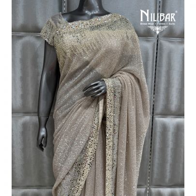 Champagne Gold Net Stitched Blouse Paired With Unstitched Saree