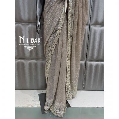 Champagne Gold Net Stitched Blouse Paired With Unstitched Saree