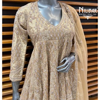 Beige Tissue Peplum Suit Paired With Palazzo