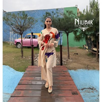 Ivory Modal Cotton Printed Top Paired With Loose Pants