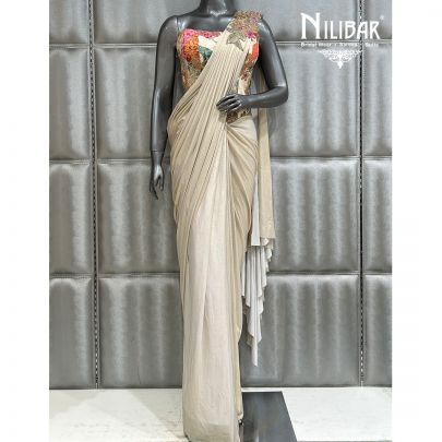 Cream Printed Saree Paired With Silk Blouse and Lycra Drape