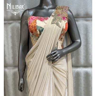 Cream Printed Saree Paired With Silk Blouse and Lycra Drape