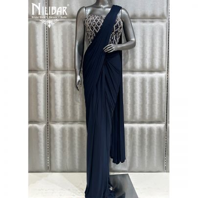 Deep Blue Saree Paired With Net Blouse and Lycra Drape