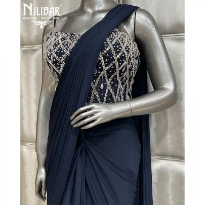 Deep Blue Saree Paired With Net Blouse and Lycra Drape