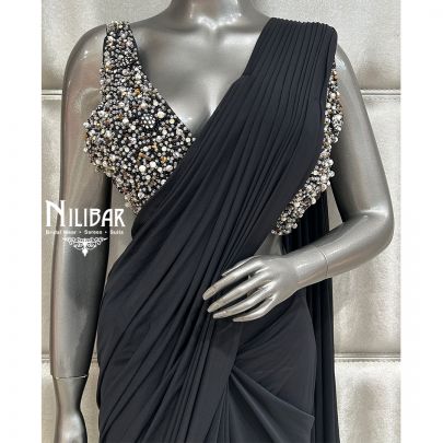 Black Saree Paired With Net Blouse and Lycra Drape