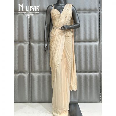 Cream Saree Paired With Net Blouse and Crepe Drape