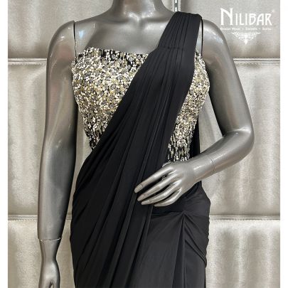 Black Saree Paired With Net Blouse and Lycra Drape