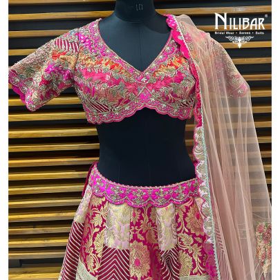 Pink Silk Lehenga Paired With Net Dupatta