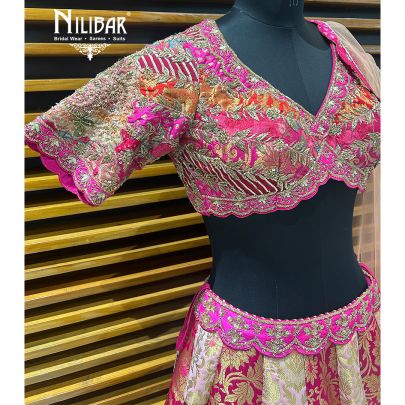 Pink Silk Lehenga Paired With Net Dupatta