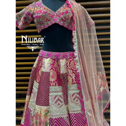 Pink Silk Lehenga Paired With Net Dupatta