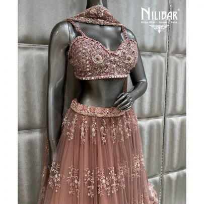 Onion Pink Embroidered Crop Top Paired With Lehenga & Soft Net Dupatta