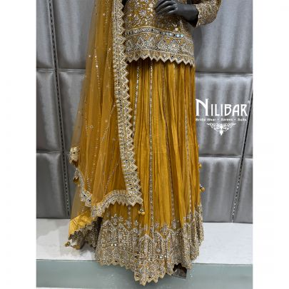 Yellow Net Short Top Paired With Lehenga & Organza Dupatta