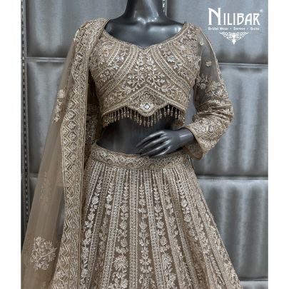 Ivory & Gold Embroidered Crop Top Paired With Lehenga & Soft Net Dupatta