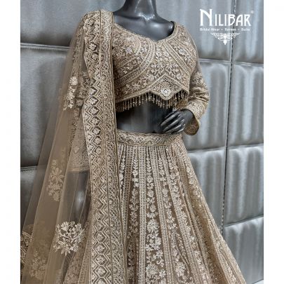 Ivory & Gold Embroidered Crop Top Paired With Lehenga & Soft Net Dupatta