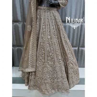 Ivory & Gold Embroidered Crop Top Paired With Lehenga & Soft Net Dupatta