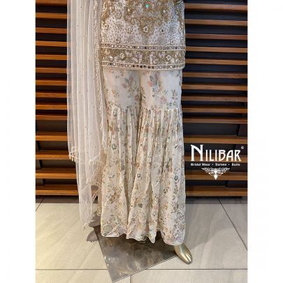 Ivory Net and Georgette Garara Suit