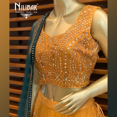 Orange and Bottle Green Net Lehenga