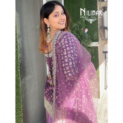Sifty Batra in Our Purple Silk Flared Palazzo Suit