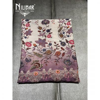 White and Purple Muslin Cotton Unstitched Suit embellished with floral print work along with muslin cotton foursided bordered dupatta.