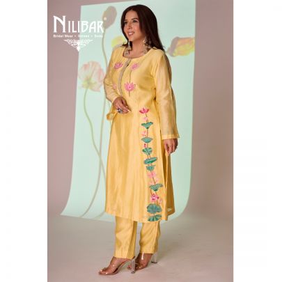 Yellow Cotton Long Kurta Paired With Pants Embellished With Thread Work