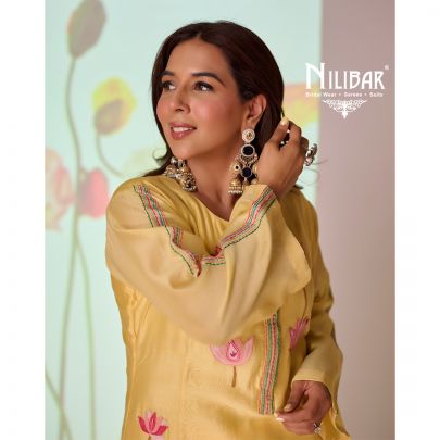 Yellow Cotton Long Kurta Paired With Pants Embellished With Thread Work