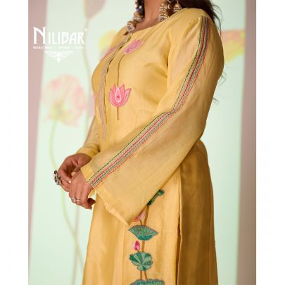 Yellow Cotton Long Kurta Paired With Pants Embellished With Thread Work