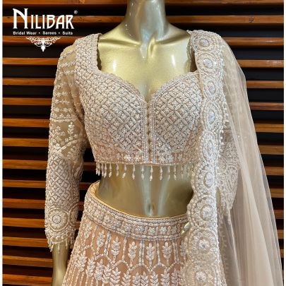 Peach Net Engagement Lehenga