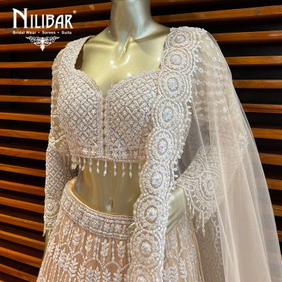 Peach Net Engagement Lehenga