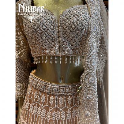 Peach Net Engagement Lehenga