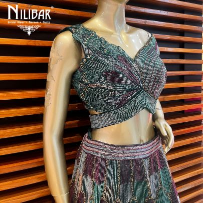Bottle Green Silk and Net Engagement Lehenga