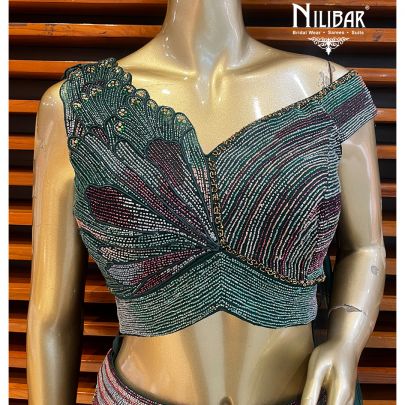 Bottle Green Silk and Net Engagement Lehenga