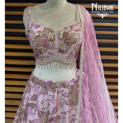 Mauve Crepe Lehenga Choli Paired With Net Dupatta