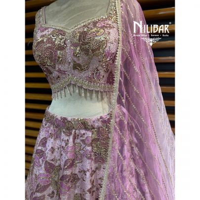 Mauve Crepe Lehenga Choli Paired With Net Dupatta