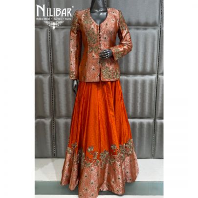 Orange Brocade Top Paired With Silk Skirt