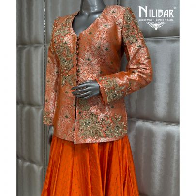 Orange Brocade Top Paired With Silk Skirt