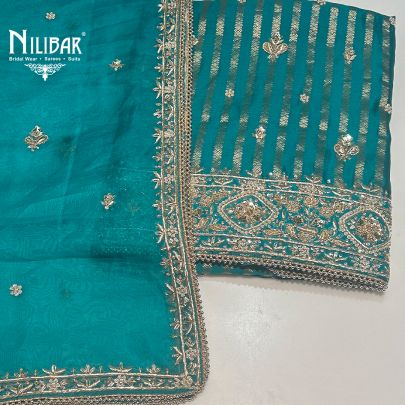 Rama Green Banarasi Silk Unstitched Suit
