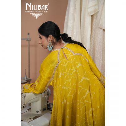 Yellow Silk Anarkali Suit Paired With Salwar & Crush Chinnon Dupatta