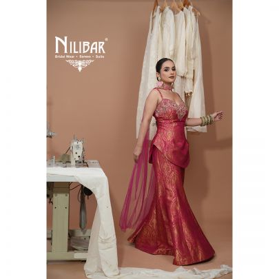 Magenta Brocade Embroidered Top Paired With Bell Bottom Pants & Net Dupatta