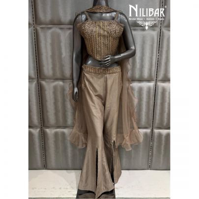 Tan Silk Corset Top Paired With Bell Bottom Pants