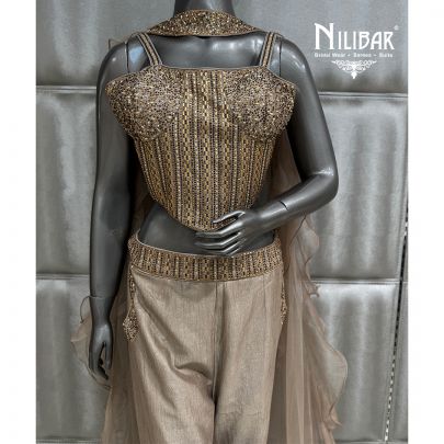 Tan Silk Corset Top Paired With Bell Bottom Pants