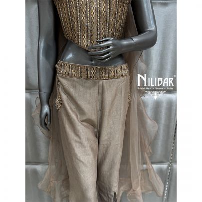 Tan Silk Corset Top Paired With Bell Bottom Pants